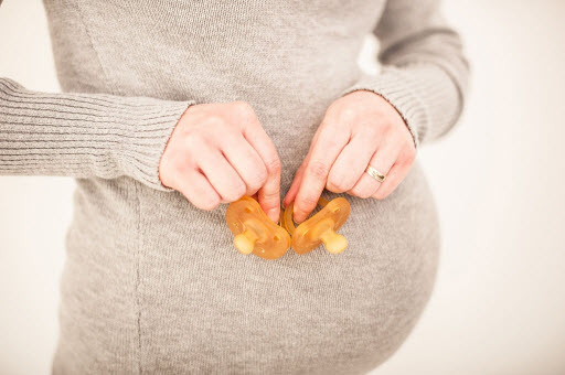 صورة أعراض الحمل بتوأم للمجربات